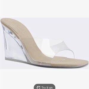 The Riri Wedge in Glass Nude
FEMME LA
Color: Glass Nude